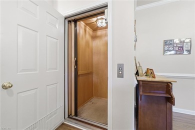 Second story condo with elevator. Covered balcony.  Large open on The Signature At West Neck in Virginia - for sale on GolfHomes.com, golf home, golf lot