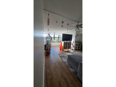 All hurricane impact windows, new A/C, hot water heater (2023) on Wynmoor Golf Course in Florida - for sale on GolfHomes.com, golf home, golf lot