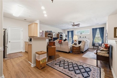 Second story condo with elevator. Covered balcony.  Large open on The Signature At West Neck in Virginia - for sale on GolfHomes.com, golf home, golf lot