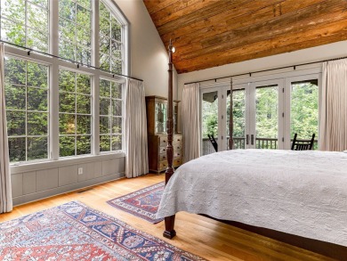Overlooking the scenic 4th hole, this stunning 4-bedroom, 4 on Lake Toxaway Country Club in North Carolina - for sale on GolfHomes.com, golf home, golf lot