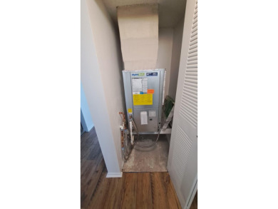 All hurricane impact windows, new A/C, hot water heater (2023) on Wynmoor Golf Course in Florida - for sale on GolfHomes.com, golf home, golf lot
