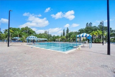 All hurricane impact windows, new A/C, hot water heater (2023) on Wynmoor Golf Course in Florida - for sale on GolfHomes.com, golf home, golf lot