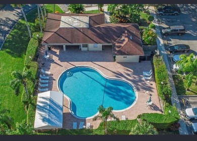 All hurricane impact windows, new A/C, hot water heater (2023) on Wynmoor Golf Course in Florida - for sale on GolfHomes.com, golf home, golf lot
