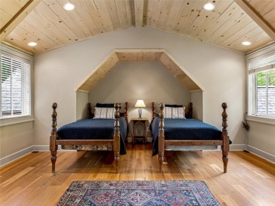 Overlooking the scenic 4th hole, this stunning 4-bedroom, 4 on Lake Toxaway Country Club in North Carolina - for sale on GolfHomes.com, golf home, golf lot