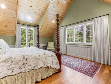 Overlooking the scenic 4th hole, this stunning 4-bedroom, 4 on Lake Toxaway Country Club in North Carolina - for sale on GolfHomes.com, golf home, golf lot