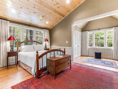 Overlooking the scenic 4th hole, this stunning 4-bedroom, 4 on Lake Toxaway Country Club in North Carolina - for sale on GolfHomes.com, golf home, golf lot