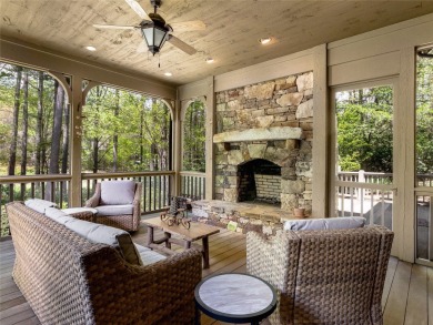 Overlooking the scenic 4th hole, this stunning 4-bedroom, 4 on Lake Toxaway Country Club in North Carolina - for sale on GolfHomes.com, golf home, golf lot