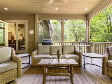 Overlooking the scenic 4th hole, this stunning 4-bedroom, 4 on Lake Toxaway Country Club in North Carolina - for sale on GolfHomes.com, golf home, golf lot