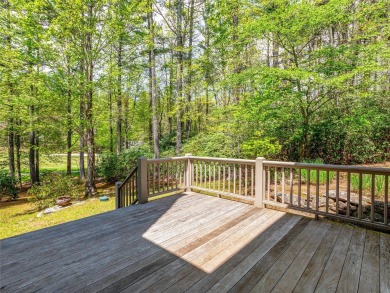 Overlooking the scenic 4th hole, this stunning 4-bedroom, 4 on Lake Toxaway Country Club in North Carolina - for sale on GolfHomes.com, golf home, golf lot