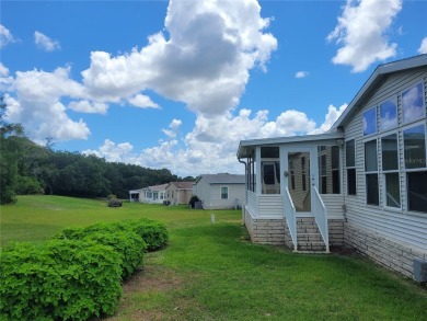 ZELLWOOD STATION 2006 TRIPLE WIDE MANUFACTURED HOME IN THE PET on Zellwood Station Country Club in Florida - for sale on GolfHomes.com, golf home, golf lot