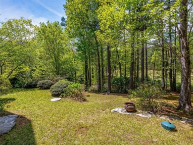 Overlooking the scenic 4th hole, this stunning 4-bedroom, 4 on Lake Toxaway Country Club in North Carolina - for sale on GolfHomes.com, golf home, golf lot
