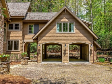 Overlooking the scenic 4th hole, this stunning 4-bedroom, 4 on Lake Toxaway Country Club in North Carolina - for sale on GolfHomes.com, golf home, golf lot