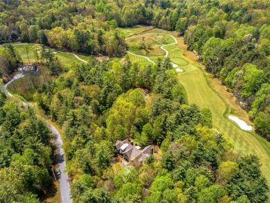 Overlooking the scenic 4th hole, this stunning 4-bedroom, 4 on Lake Toxaway Country Club in North Carolina - for sale on GolfHomes.com, golf home, golf lot