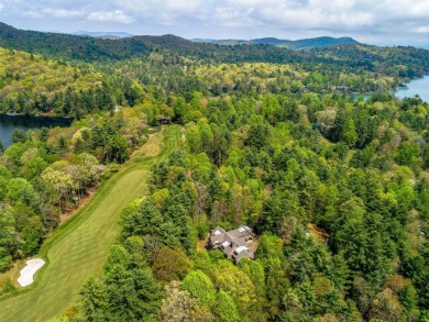 Overlooking the scenic 4th hole, this stunning 4-bedroom, 4 on Lake Toxaway Country Club in North Carolina - for sale on GolfHomes.com, golf home, golf lot