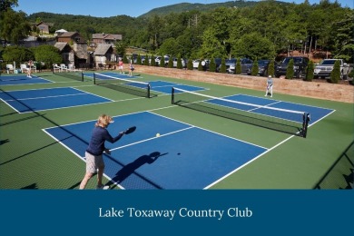 Overlooking the scenic 4th hole, this stunning 4-bedroom, 4 on Lake Toxaway Country Club in North Carolina - for sale on GolfHomes.com, golf home, golf lot