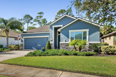 This beautiful home offers many upgrades for all your living on Plantation Bay Golf and Country Club in Florida - for sale on GolfHomes.com, golf home, golf lot