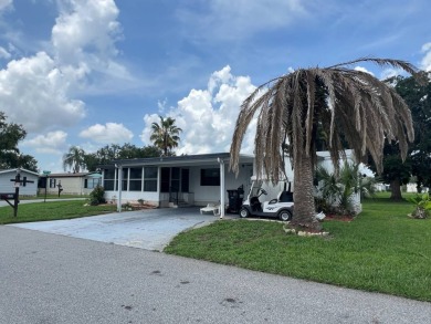 Charming home located in highly sought after Hidden Golf Club on Lake Henry Golf Club in Florida - for sale on GolfHomes.com, golf home, golf lot