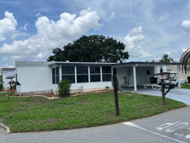 Charming home located in highly sought after Hidden Golf Club on Lake Henry Golf Club in Florida - for sale on GolfHomes.com, golf home, golf lot