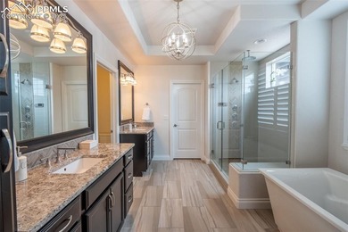 Stunning 7-bedroom, 5.5-bath home in the coveted Flying Horse on The Club At Flying Horse in Colorado - for sale on GolfHomes.com, golf home, golf lot