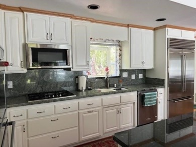 Perfectly positioned on the golf course and just one block from on Lake Almanor Country Club in California - for sale on GolfHomes.com, golf home, golf lot