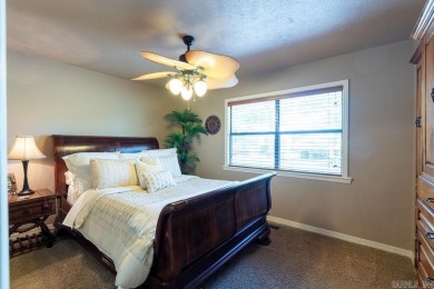Welcome to your escape at the Lakewood Hills Condo. This unit on Indian Hills Country Club in Arkansas - for sale on GolfHomes.com, golf home, golf lot