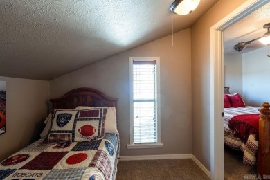 Welcome to your escape at the Lakewood Hills Condo. This unit on Indian Hills Country Club in Arkansas - for sale on GolfHomes.com, golf home, golf lot