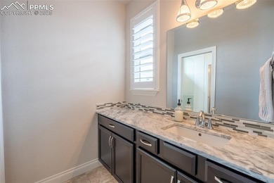 Stunning 7-bedroom, 5.5-bath home in the coveted Flying Horse on The Club At Flying Horse in Colorado - for sale on GolfHomes.com, golf home, golf lot