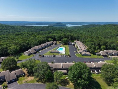 Welcome to your escape at the Lakewood Hills Condo. This unit on Indian Hills Country Club in Arkansas - for sale on GolfHomes.com, golf home, golf lot