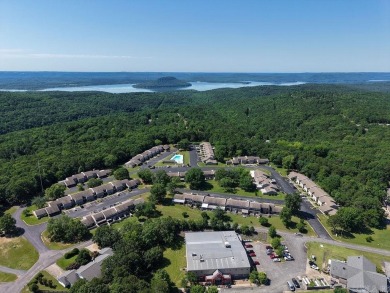Welcome to your escape at the Lakewood Hills Condo. This unit on Indian Hills Country Club in Arkansas - for sale on GolfHomes.com, golf home, golf lot