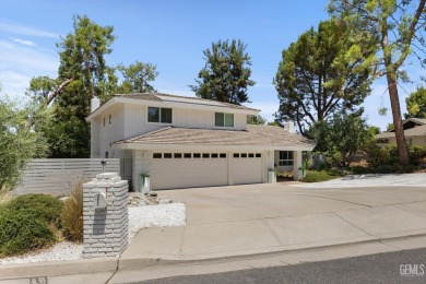 Stunning 4 bedroom, 3 bathroom home sitting on just shy of a on Kern River Golf Course in California - for sale on GolfHomes.com, golf home, golf lot
