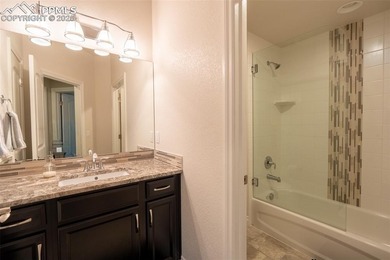 Stunning 7-bedroom, 5.5-bath home in the coveted Flying Horse on The Club At Flying Horse in Colorado - for sale on GolfHomes.com, golf home, golf lot