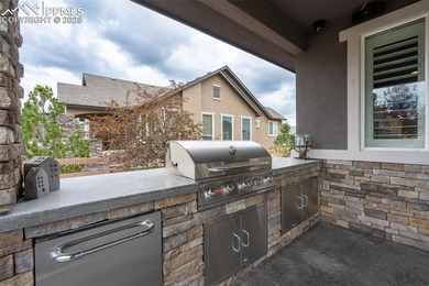 Stunning 7-bedroom, 5.5-bath home in the coveted Flying Horse on The Club At Flying Horse in Colorado - for sale on GolfHomes.com, golf home, golf lot