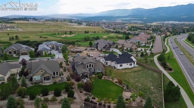 Stunning 7-bedroom, 5.5-bath home in the coveted Flying Horse on The Club At Flying Horse in Colorado - for sale on GolfHomes.com, golf home, golf lot