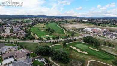 Stunning 7-bedroom, 5.5-bath home in the coveted Flying Horse on The Club At Flying Horse in Colorado - for sale on GolfHomes.com, golf home, golf lot