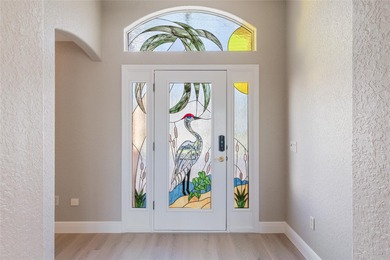 ONE OF A KIND IN SUNSET POINTE! Located on HERON GOLF COURSE on Glenview Championship Golf and Country Club in Florida - for sale on GolfHomes.com, golf home, golf lot