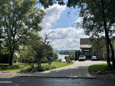 ONE OF THE LAST LAKE AND MOUNTAIN VIEW lots in the fabulous on Tellico Village Golf Club in Tennessee - for sale on GolfHomes.com, golf home, golf lot