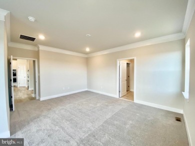 MOVE IN READY-FINISHED BASEMENT AND UPPER LEVEL!  Photos are of on Plantation Lakes Golf and Country Club in Delaware - for sale on GolfHomes.com, golf home, golf lot
