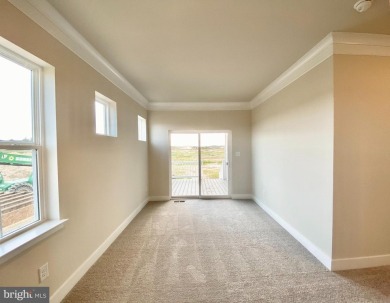 MOVE IN READY-FINISHED BASEMENT AND UPPER LEVEL!  Photos are of on Plantation Lakes Golf and Country Club in Delaware - for sale on GolfHomes.com, golf home, golf lot