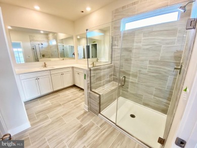 MOVE IN READY-FINISHED BASEMENT AND UPPER LEVEL!  Photos are of on Plantation Lakes Golf and Country Club in Delaware - for sale on GolfHomes.com, golf home, golf lot