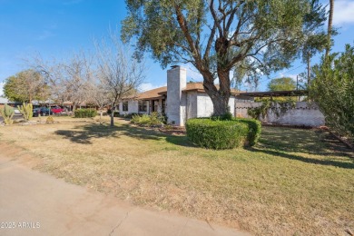 Move in ready, mid-century brick home in Uptown Phoenix! This on Palo Verde Golf Course in Arizona - for sale on GolfHomes.com, golf home, golf lot