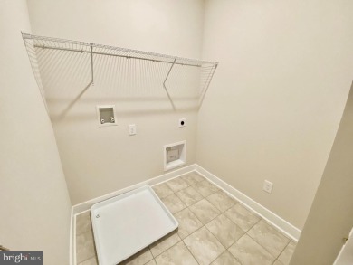 MOVE IN READY-FINISHED BASEMENT AND UPPER LEVEL!  Photos are of on Plantation Lakes Golf and Country Club in Delaware - for sale on GolfHomes.com, golf home, golf lot