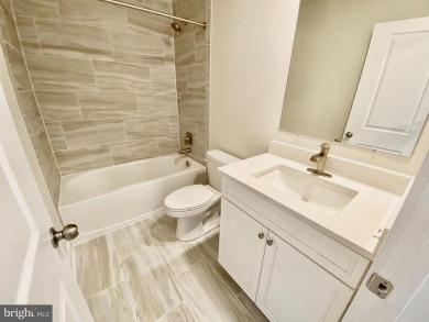 MOVE IN READY-FINISHED BASEMENT AND UPPER LEVEL!  Photos are of on Plantation Lakes Golf and Country Club in Delaware - for sale on GolfHomes.com, golf home, golf lot