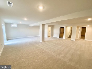 MOVE IN READY-FINISHED BASEMENT AND UPPER LEVEL!  Photos are of on Plantation Lakes Golf and Country Club in Delaware - for sale on GolfHomes.com, golf home, golf lot