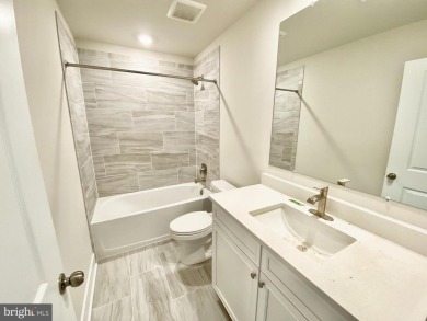 MOVE IN READY-FINISHED BASEMENT AND UPPER LEVEL!  Photos are of on Plantation Lakes Golf and Country Club in Delaware - for sale on GolfHomes.com, golf home, golf lot