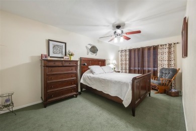 Enjoy lakefront living in this charming 2 bedroom, 1.5 bath on De Cordova Bend Country Club in Texas - for sale on GolfHomes.com, golf home, golf lot