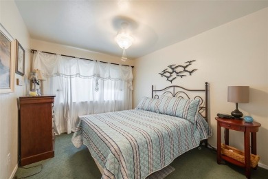 Enjoy lakefront living in this charming 2 bedroom, 1.5 bath on De Cordova Bend Country Club in Texas - for sale on GolfHomes.com, golf home, golf lot