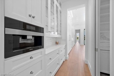 *IMMEDIATE GOLF MEMBERSHIP* Experience unparalleled elegance in on Quail West Golf and Country Club in Florida - for sale on GolfHomes.com, golf home, golf lot