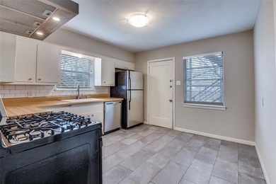 Fully leased duplex in the desirable Kings Highway neighborhood on Stevens Park Golf Course in Texas - for sale on GolfHomes.com, golf home, golf lot