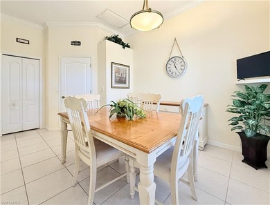 Beautifully maintained 2BR + Den / 2BA / 2-Car Garage villa with on Naples Heritage Golf and Country Club in Florida - for sale on GolfHomes.com, golf home, golf lot