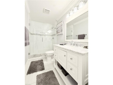 Beautifully maintained 2BR + Den / 2BA / 2-Car Garage villa with on Naples Heritage Golf and Country Club in Florida - for sale on GolfHomes.com, golf home, golf lot